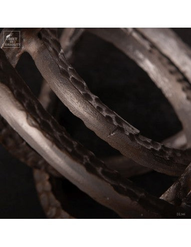 Black metal armillary
