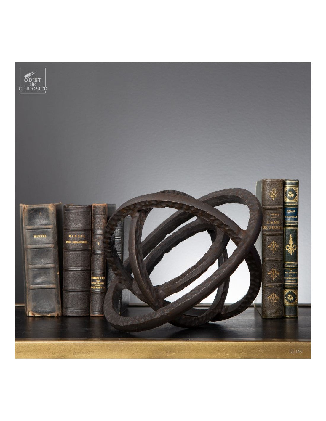 Black metal armillary